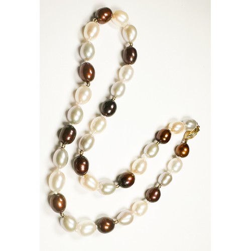 174 - A single row of bronze and cream freshwater pearls, knotted with 10 x small gold beads and a 14ct ov... 