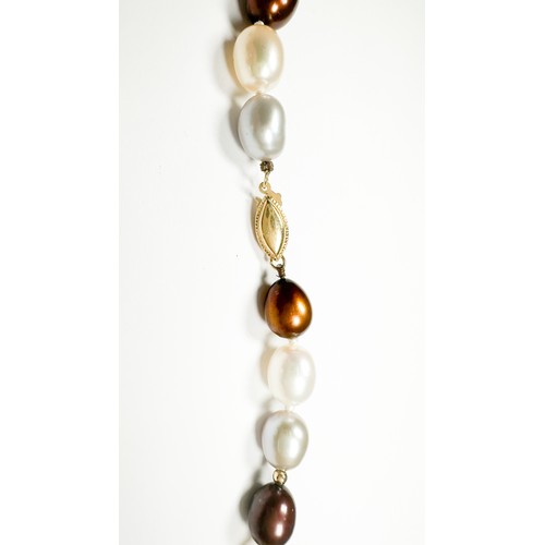 174 - A single row of bronze and cream freshwater pearls, knotted with 10 x small gold beads and a 14ct ov... 