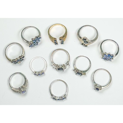 188 - Eleven various silver dress rings, set with sapphires and diamonds, total weight 41.7 grams.