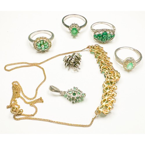202 - Four assorted silver rings, set with emeralds and diamonds, together with two various emerald set pe... 