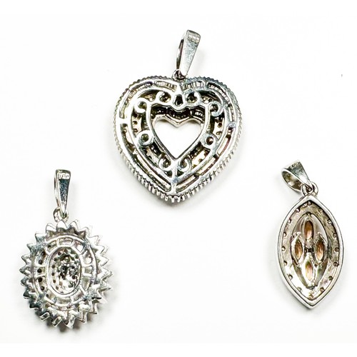 209 - Three diamond set silver pendants, estimated total diamond weight 1.00cts.