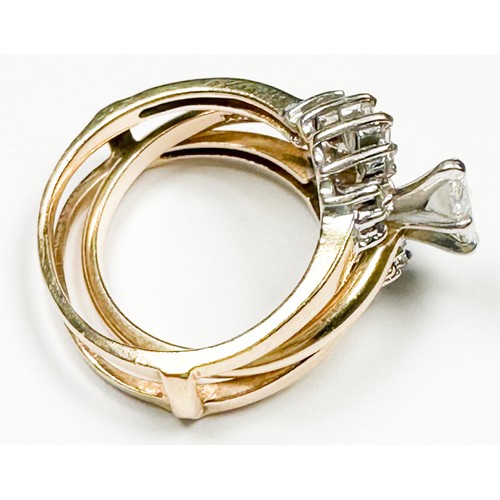 217 - A 14ct yellow gold trilogy ring, set with a marquise cut diamond to the centre, estimated weight 0.3... 