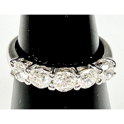 237 - An 18ct white gold diamond ring, set with 5 x round brilliant cut diamonds, estimated total weight 0... 