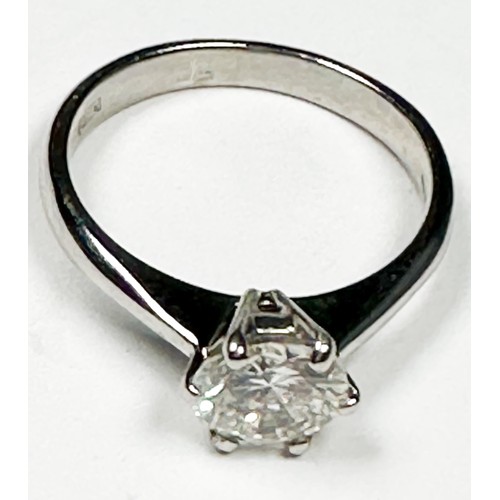 240 - An 18ct white gold solitaire diamond ring, six-claw set with a round brilliant cut diamond, I colour... 