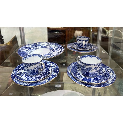 44 - A Royal Crown Derby part-dessert set comprising three trios of cup, saucer and side plate, together ... 