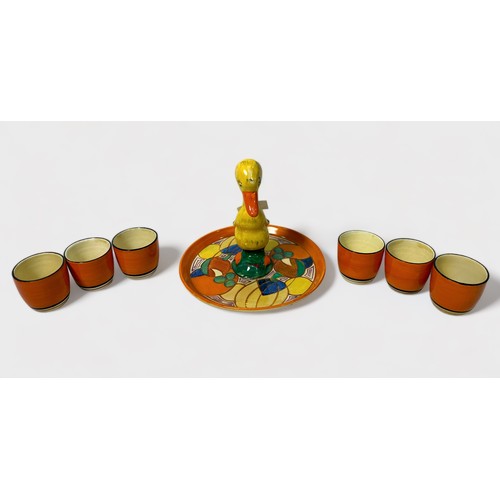 42 - A Clarice Cliff Bizarre ‘Mr Puddleduck’ novelty egg cup cruet set for six, circa 1930, in the ‘Melon... 