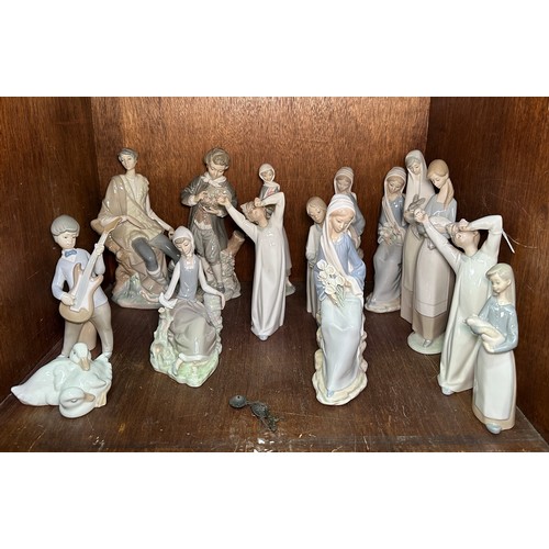 52 - Thirteen various Lladro porcelain figures and two NAO figures. (15) (IN SECTION 46)