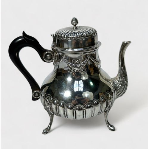 119 - A silver teapot by C. S. Harris & Sons Ltd, with relief moulded reeded decoration and swags, ebonise... 
