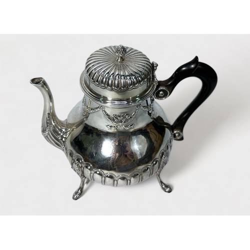 119 - A silver teapot by C. S. Harris & Sons Ltd, with relief moulded reeded decoration and swags, ebonise... 