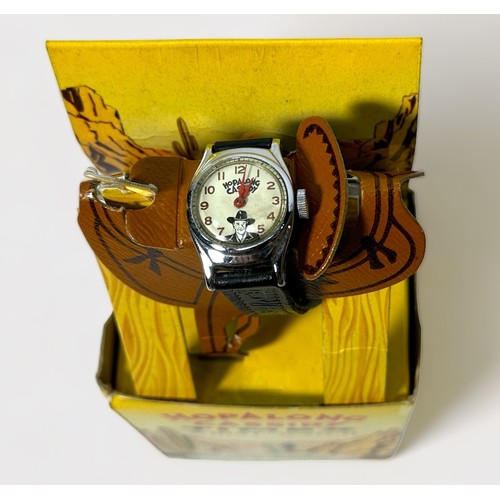 146 - A mid-20th century Hopalong Cassidy Timex wristwatch, the white dial with Arabic numerals denoting h... 