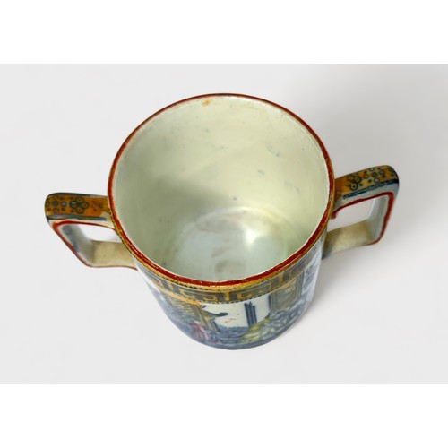 69 - An early 19th century Staffordshire Pottery two-handled Loving Cup printed and painted with Chinoiss... 