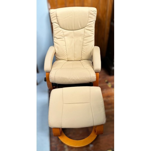 770 - A cream leather reclining swivel armchair and matching footstool