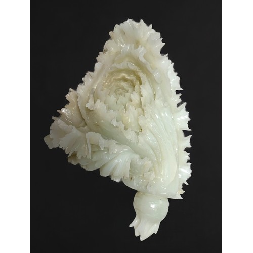 83 - A well-carved Chinese jade 'coloured 'soapstone sculpture of a flower, 30cm long