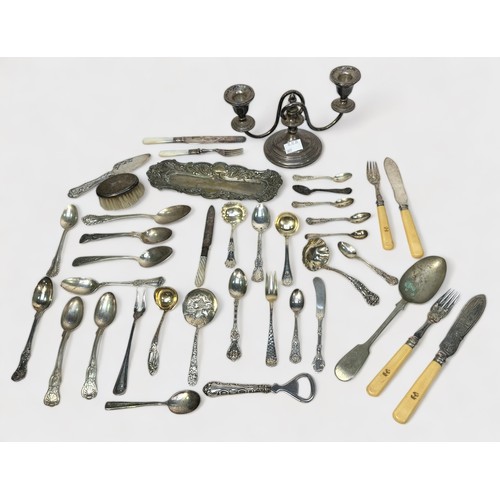 124 - A good collection of assorted silver flatware including some Victorian spoons by Chawner & Co. And B... 