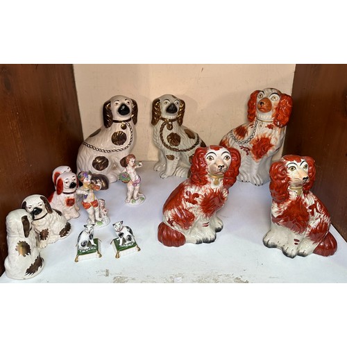 71 - Four various pairs of Staffordshire pottery seated spaniels, a single example, pair of seated porcel... 