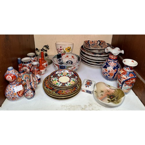 82 - A good quantity of Japanese Imari porcelain vases, bowls and plates etc, together with other porcela... 