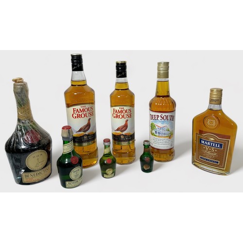 779 - A 24 fl.oz bottle of Benedictine, 73 proof, together with three smaller bottles of the same, a 1 lit... 