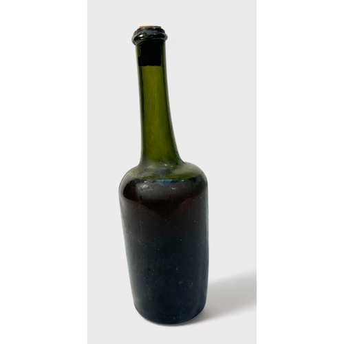 774 - A late 18th century bottle of French Calvados Brandy, hand-made mallet shape bottle with kicked-in b... 