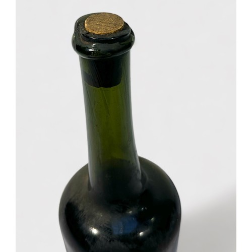 774 - A late 18th century bottle of French Calvados Brandy, hand-made mallet shape bottle with kicked-in b... 