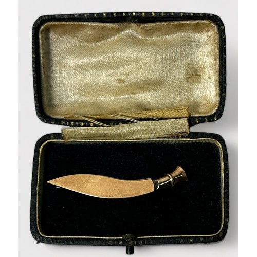 204 - A 9ct gold brooch modelled as a Kukri knife with sheath, together with a 9ct gold pin, set with a la... 