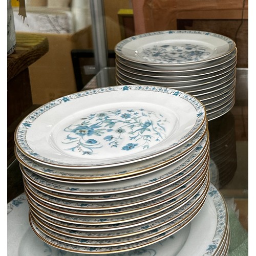 19 - An extensive Haviland Limoges dinner service, comprising approximately 298 pieces, in a blue floral ... 