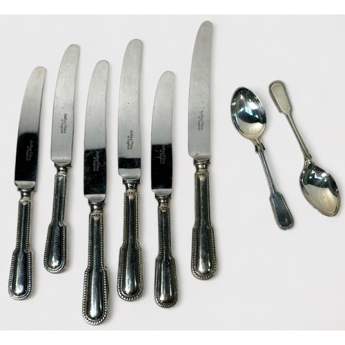 114 - A small collection of assorted silver, comprising, five silver-handled knives, sugar tongs, caddy sp... 