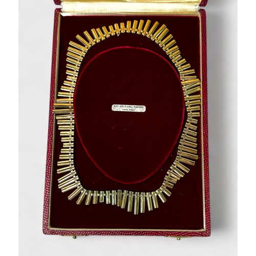 205 - A 9ct gold necklace of undulating fringe design, 37.47g, in fitted retail box