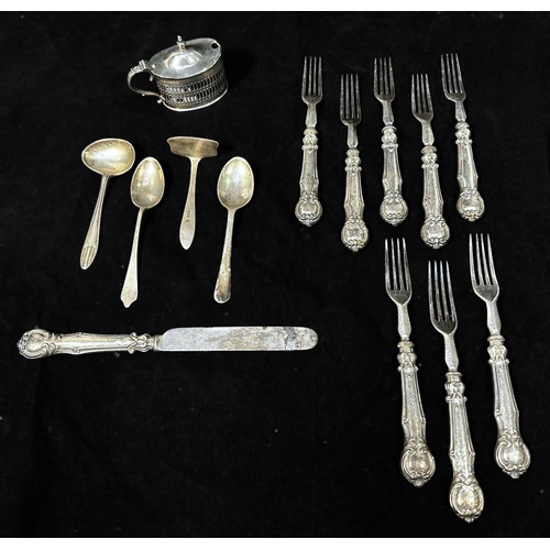 123 - A set of eight silver-handled dessert forks and one knife, together with an infant's silver spoon an... 