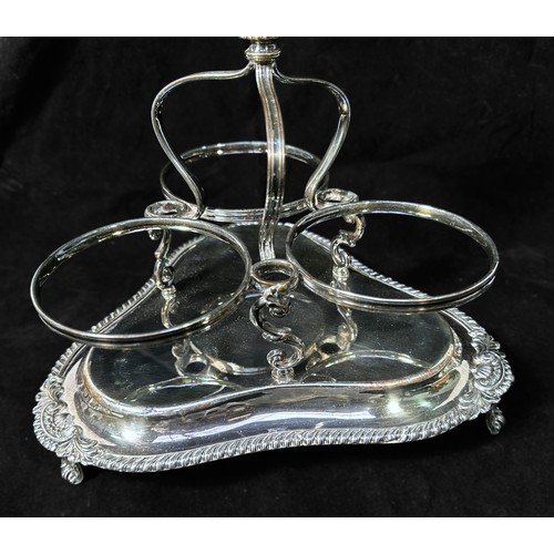 120 - A Victorian silver-plated three-bottle decanter stand, with three original hobnail and panel-cut gla... 