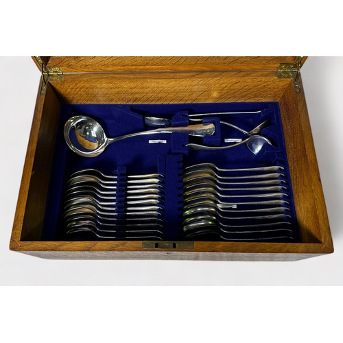 125 - A mid 20th century oak three-tier canteen of cutlery comprising Roberts & Belk Old English pattern s... 