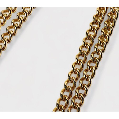 218 - A 9ct gold double Albert chain with dog clips and t-bar, 51cm end to end, gross weight approximately... 