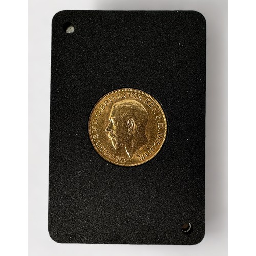 286 - A George V Gold Sovereign, 1926, mint mark for Pretoria, South Africa, 22ct, 7.98g, VF, in two-piece... 