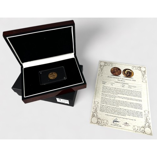 286 - A George V Gold Sovereign, 1926, mint mark for Pretoria, South Africa, 22ct, 7.98g, VF, in two-piece... 