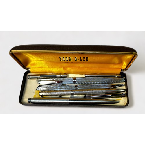 470 - A small collection of assorted pens and propelling pencils including a silver Yard-O-Led propelling ... 