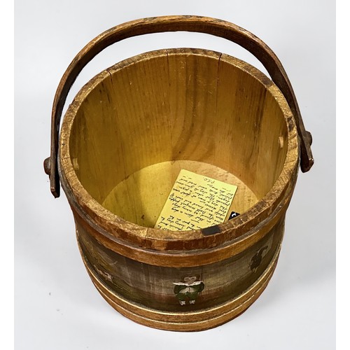 467 - A Victorian firkin bucket, of cylindrical form with bentwood swing handle, the lid and sides painted... 