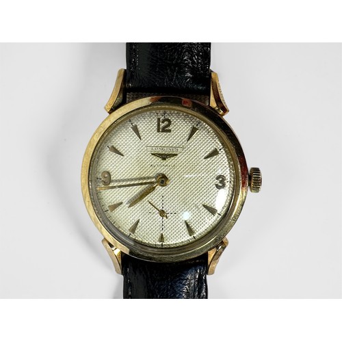 161 - A gents 10ct gold filled Longines automatic wristwatch, c.1950’s, the textured silvered dial with gi... 