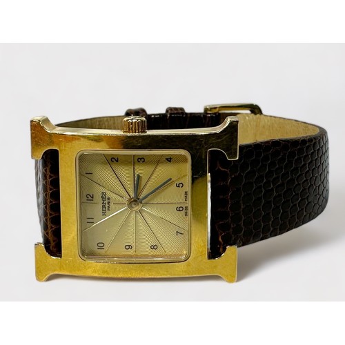 172 - A ladies gold-plated Hermes wristwatch, model ‘HH1.201’, the textured dial with gilt decoration and ... 