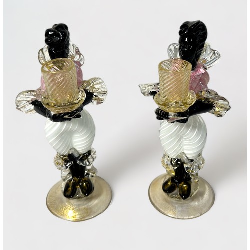 39 - A garniture of Murano Glass Blackamoor figural candlesticks, pink, white and black glass with gold i... 