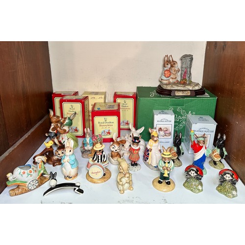 40 - A collection of assorted ceramic bunny figures including Royal Doulton, Royal Albert, Beswick and W.... 