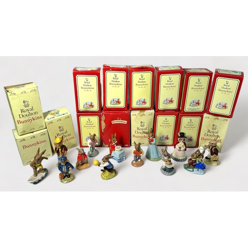 33 - A collection of twelve assorted boxed Royal Doulton Bunnykins figures, to include, Welsh Lady DB172 ... 