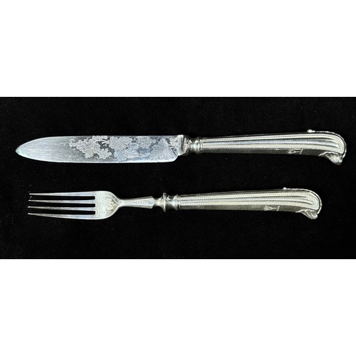 134 - A Victorian Silver dessert set of 12-each knives and forks, with silver blades and handles, the blad... 