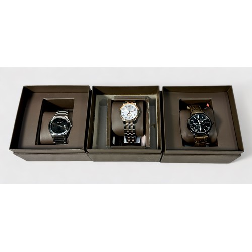 179 - Three various gents contemporary Roamer wristwatches, in branded and fitted boxes