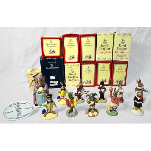 34 - A collection of eleven assorted boxed Royal Doulton Bunnykins figures, to include, Rock and Roll DB1... 