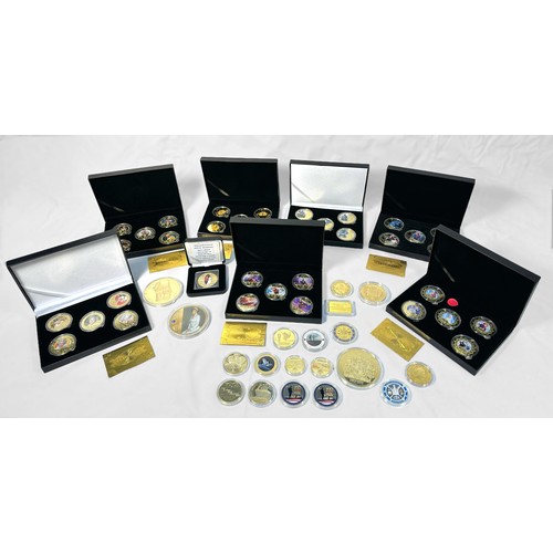 316 - Eight assorted cased 24K gold-plated commemorative coin sets, of various subjects including, QEII, M... 