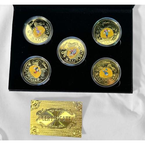 316 - Eight assorted cased 24K gold-plated commemorative coin sets, of various subjects including, QEII, M... 