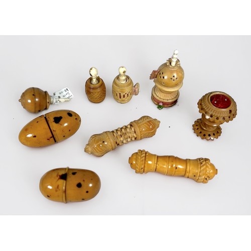 362 - Nine late 19th century carved vegetable ivory sewing items including a chess-piece tape measure/pin ... 