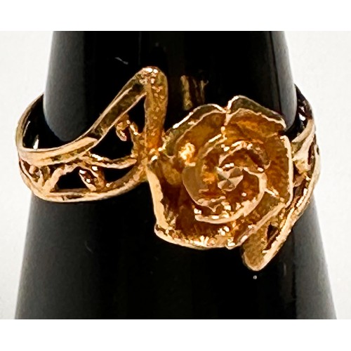 232 - A 22ct yellow gold dress ring, in a rose-petal design with pierced foliate band, weight 2.5 grams, s... 