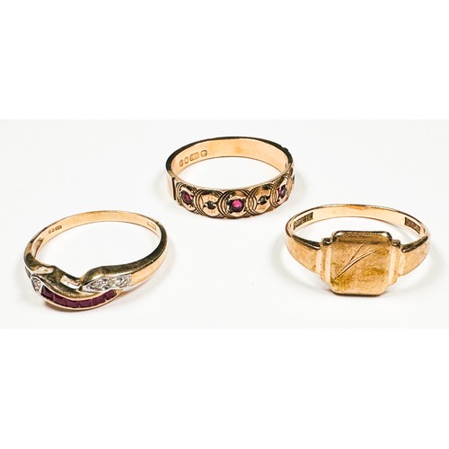 233 - A 9ct gold signet ring, together with two various dress rings, both set with red and white stones, t... 