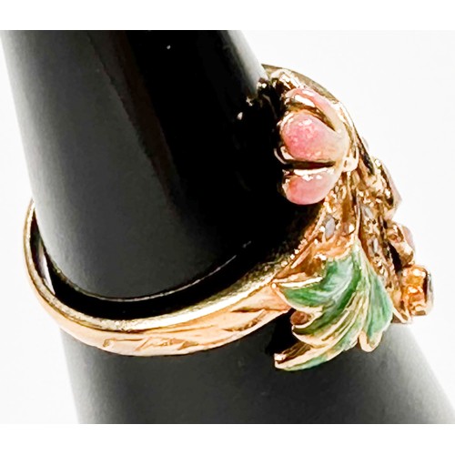 223 - An 18ct yellow gold dress ring in a foliate style, set with small diamonds in pink and green enamell... 