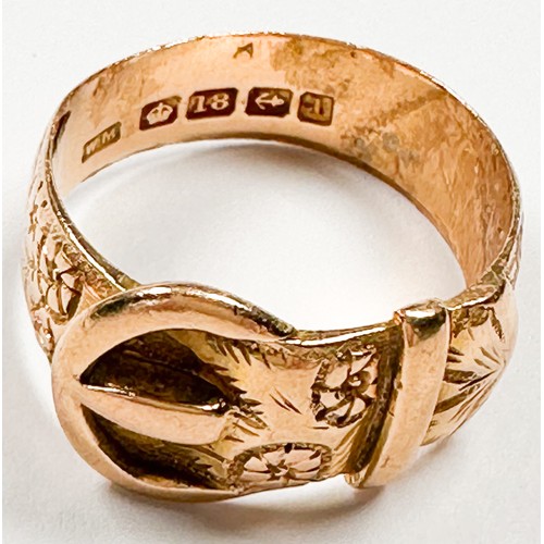 224 - An 18ct yellow gold buckle ring with foliate engraving, ring weighs 8.6 grams, hallmarked 1910.